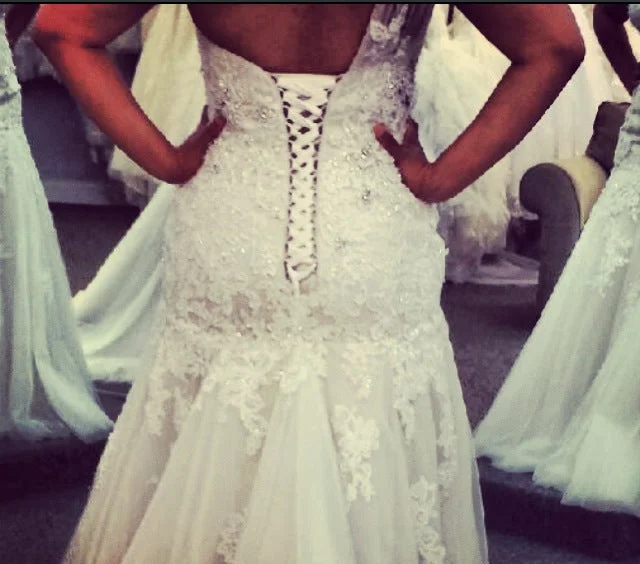 Maggie Sottero Bernadine Tiered unclassified dresses